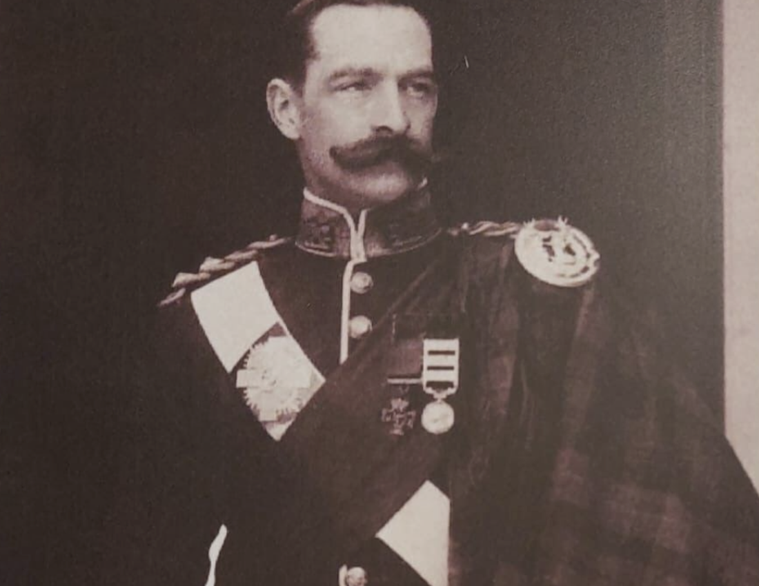 A photograph of BWBF's founder Sir Ernest Beachcrost Beckwith Towse. He is wearing military uniform and medals. He has short brown hair and a prominent moustache.
